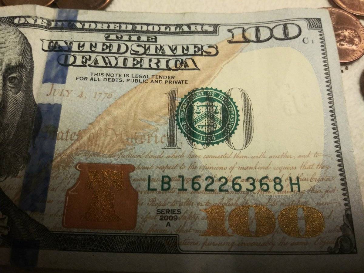 100-Dollar-Bill-With-Unique-Stamp-On-It